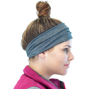 Side shot of women wearing a striped/grey merino wool reversible sports winter ear warmer