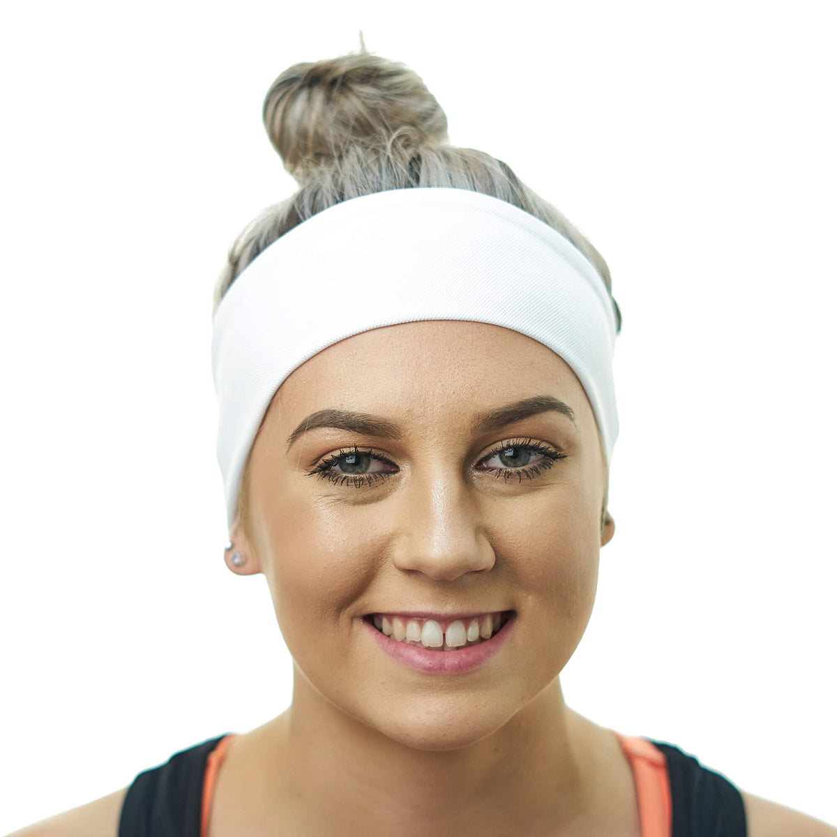 Women wearing black tie behind exercise headband